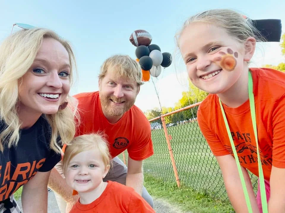 Stephen with students and family members at a school event